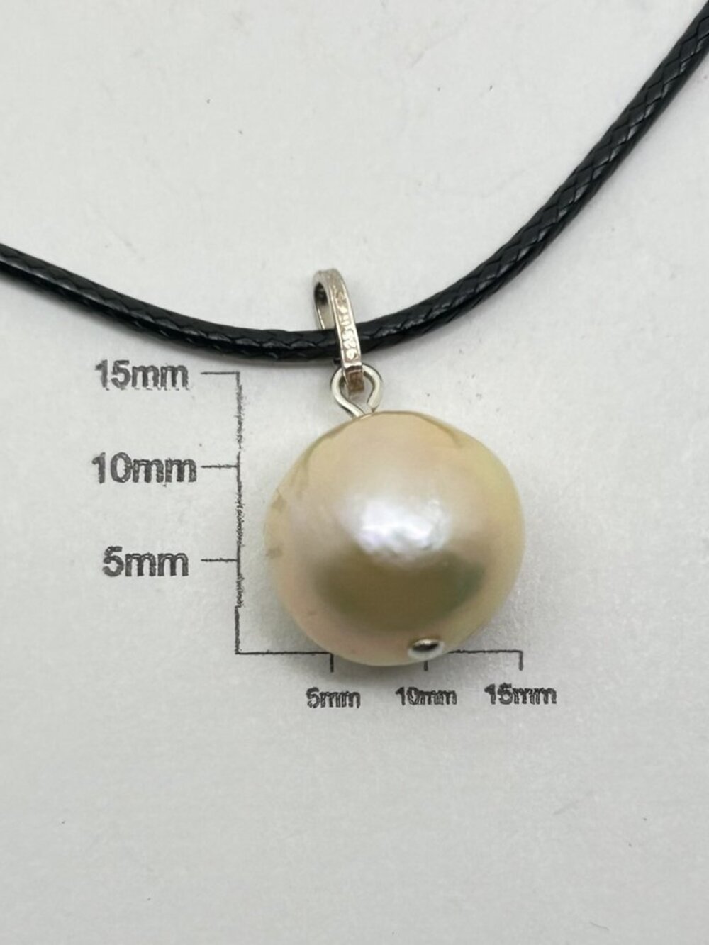Natural Nucleated Freshwater Edison Pearl Charm.